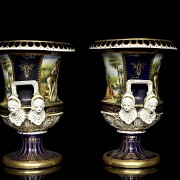 Pair of porcelain enamelled urns ‘Lovers’, 20th century