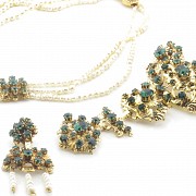 Fallera's adornments in gold metal and green stones