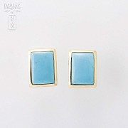 Earrings and turquoise ring in 18k yellow gold.