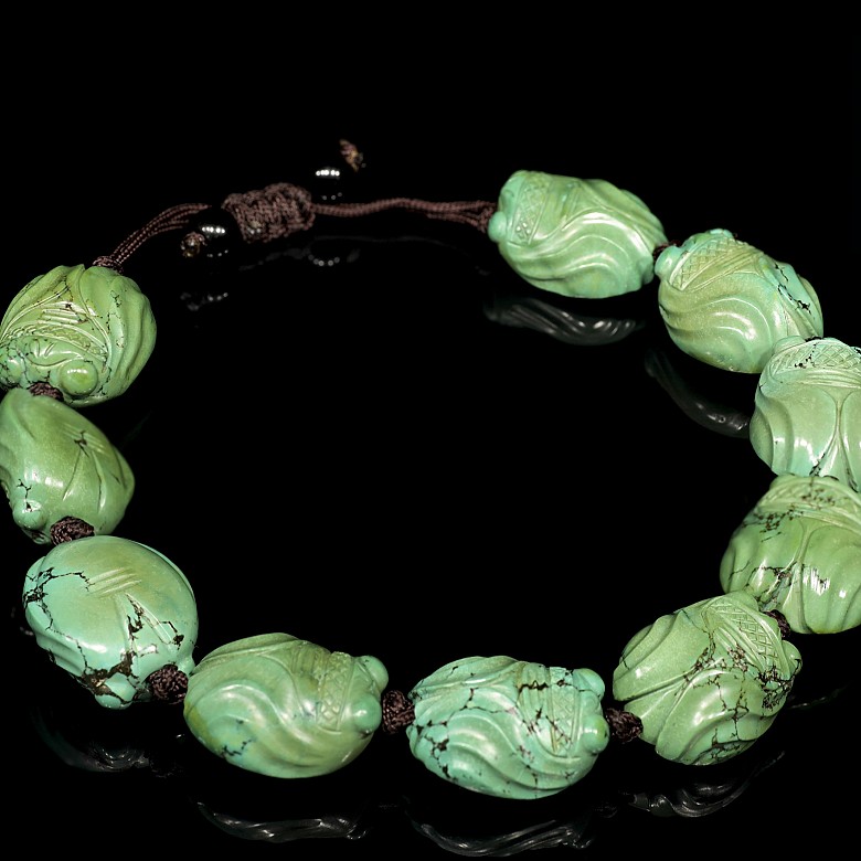 Bracelet with ten carved turquoise beads, Eastern Zhou Dynasty