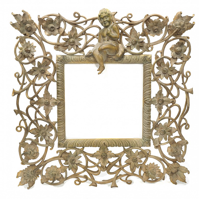 Vicente Andreu. Two fretworked wooden frames with cherubs, 20th century.