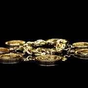 Gold bracelet with seven coins