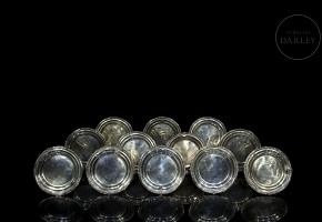 Colección de doce platos de postre de plata mexicana 