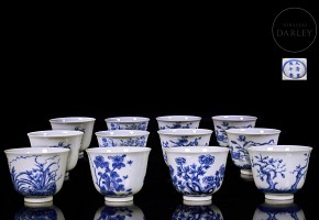 Set of twelve blue and white porcelain mugs, 20th century