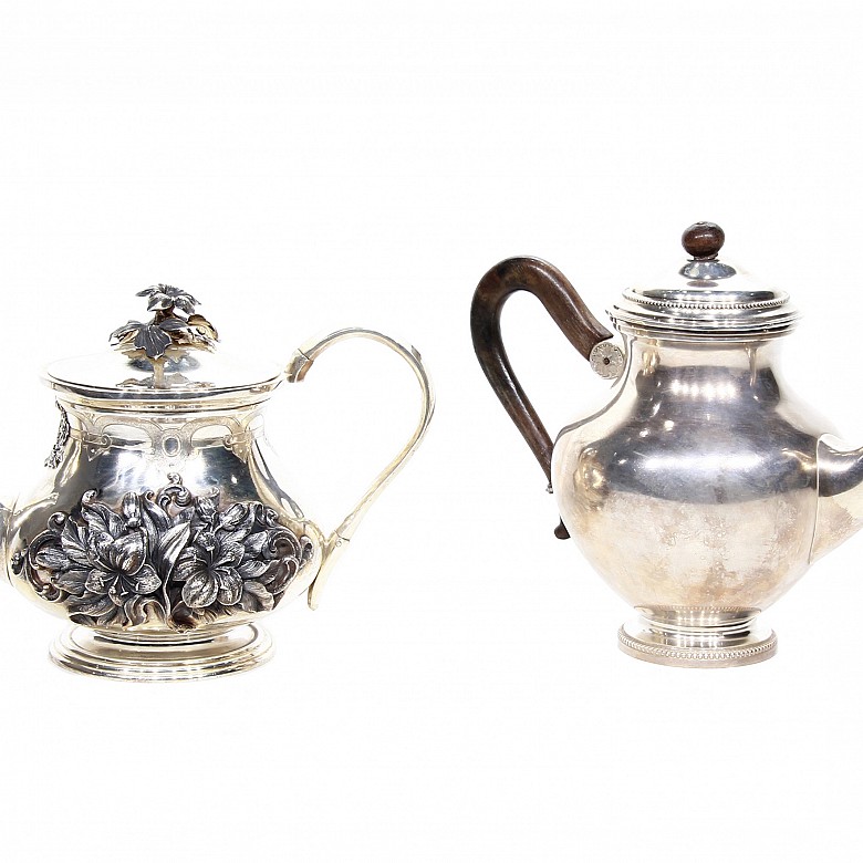 Two Dutch punched silver teapots, 933 silver.