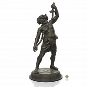 Figura en bronce según el 