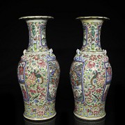 Pair of enamelled vases famille rose “Palace scenes”, Qing dynasty