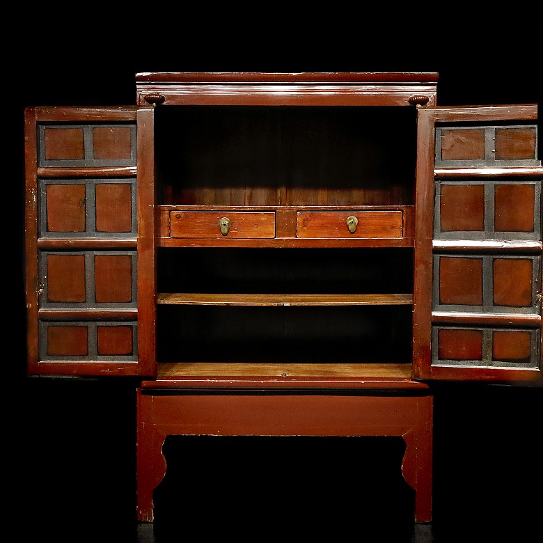 Chinese cupboard lacquered in red, 20th century