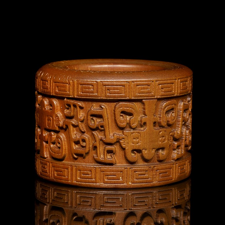 Carved wooden ring, 20th Century