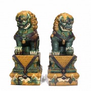 Pair of glazed ceramic lions, 20th century