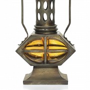 Metal and glass lantern.