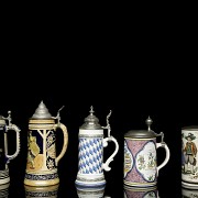 Five glazed ceramic beer steins, 20th century