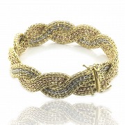 Braided bracelet in 18k gold