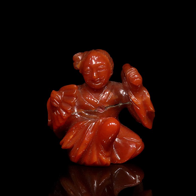 Pequeña figura china de coral 