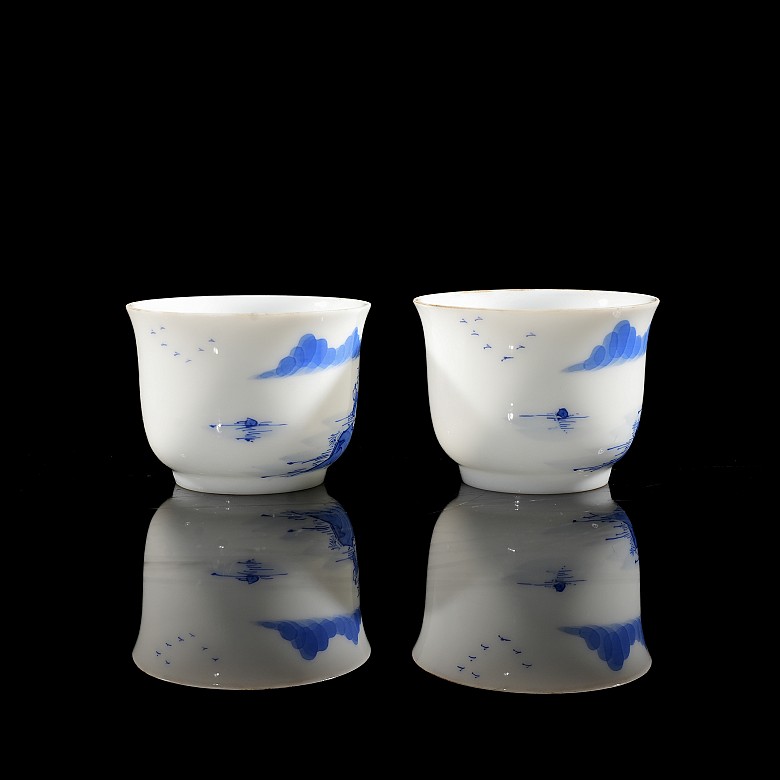 Pair of small porcelain ‘Landscape’ cups, Qing dynasty