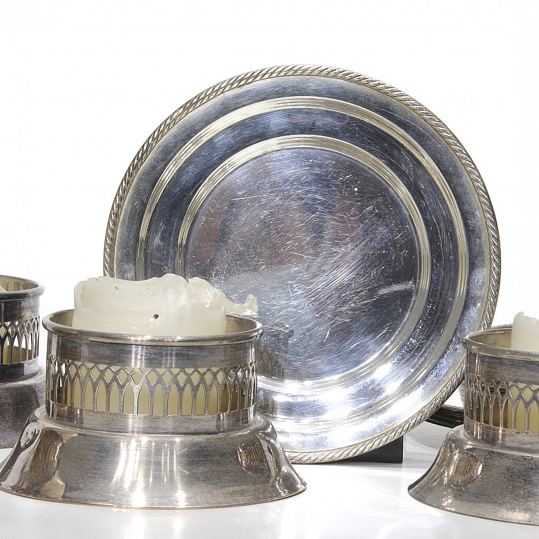 Set of Bulgari silver candleholders and other candleholders and plates, 20th century