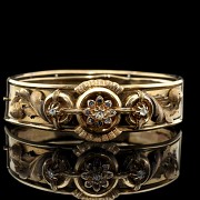 Brazalete de oro amarillo 18 kt y brillantes