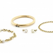 Set of pieces in 18k yellow gold