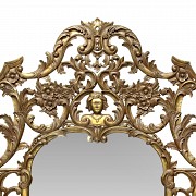 Large gilded wooden mirror, Louis XVI style