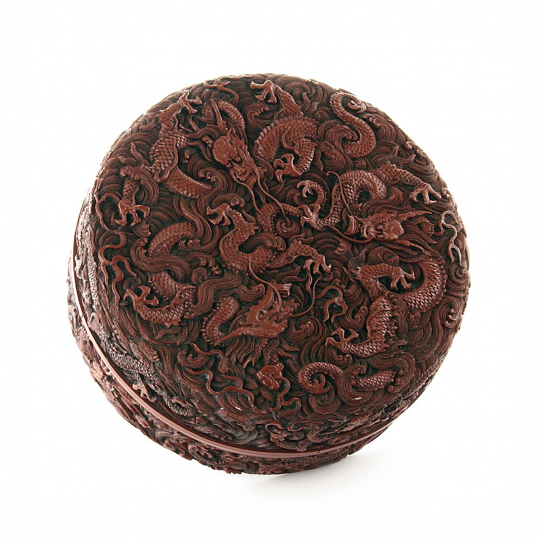 A carved cinnabar lacquer 