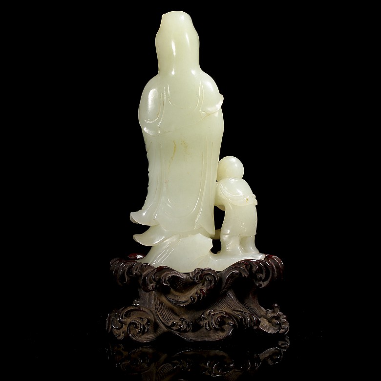 Hetian “Guanyin and Shancai” white jade figurine, Qing dynasty