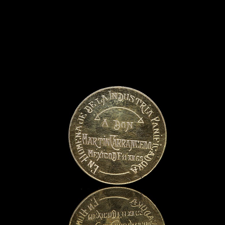 Moneda medalla de oro 