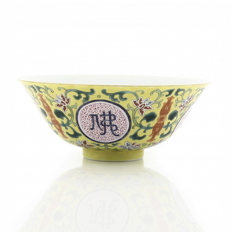 A famille rose yellow-ground bowl, Qianlong seal mark.