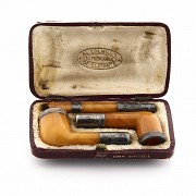 Set of two pipes and a mouthpiece of amber and silver, 19th century