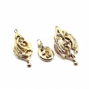 Two brooches and a gold pendant