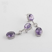 Long earrings with amethysts and diamonds.