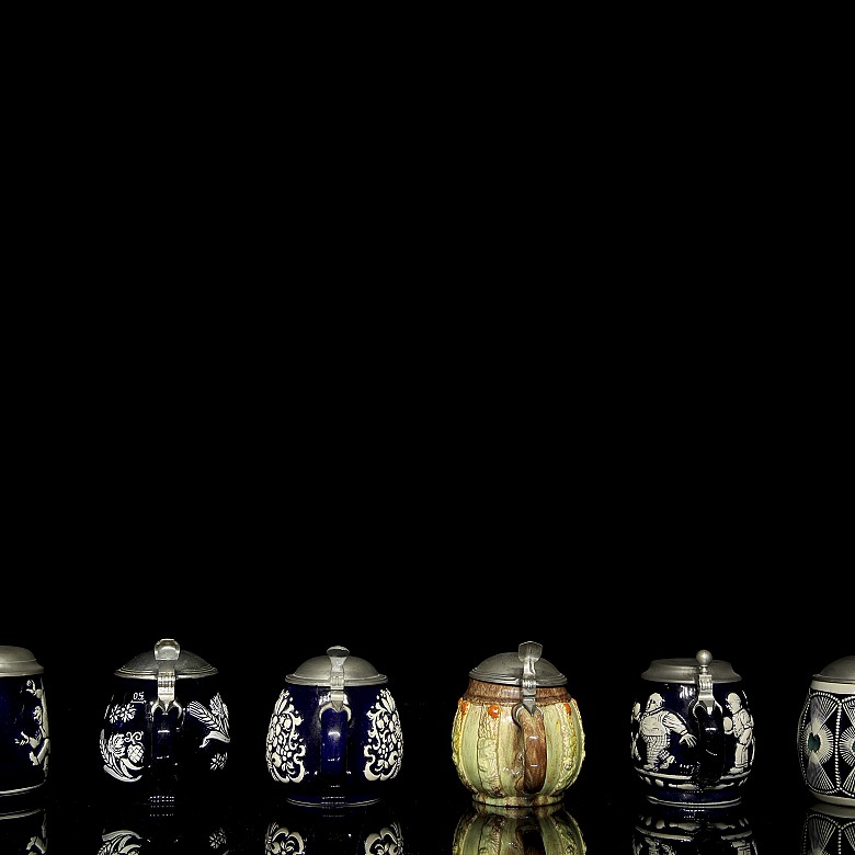 Six enamelled German beer steins, 20th century