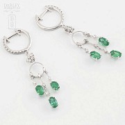 Earrings in 18k white gold, emeralds and diamonds