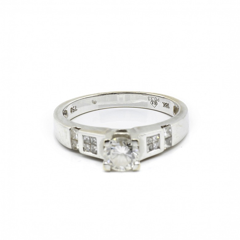 Solitaire diamond ring.