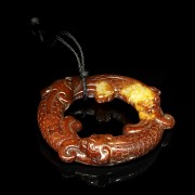 Tail biting dragon hoop, Eastern Han dynasty