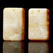 Pair of ‘Dragon and Child’ jade plaques, Qing dynasty