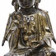 A gilt-bronze figure 