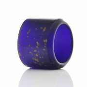 Archer's ring of blue glass and gold leaf shavings, 20th century