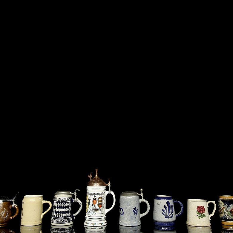 Collection of ten ceramic beer steins, 20th century