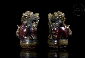 Pair of ceramic ‘Lions’ figures, Qing Dynasty