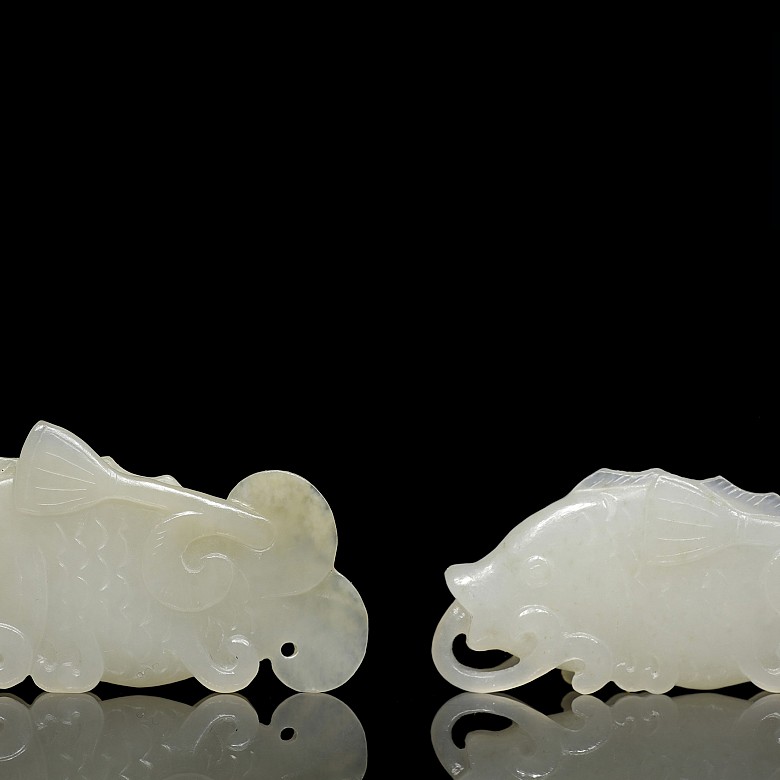 Two white jade fish plaques, 20th century