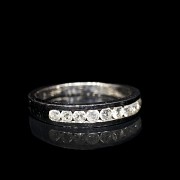 Half wedding ring in white gold with diamonds on rails