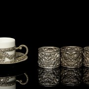 Conjunto de objetos de plata y porcelana 