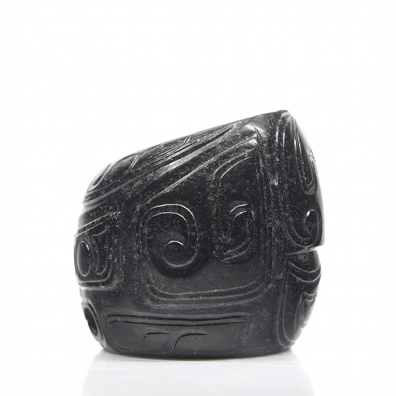 Green jade archer ring “Mask”, Shang style