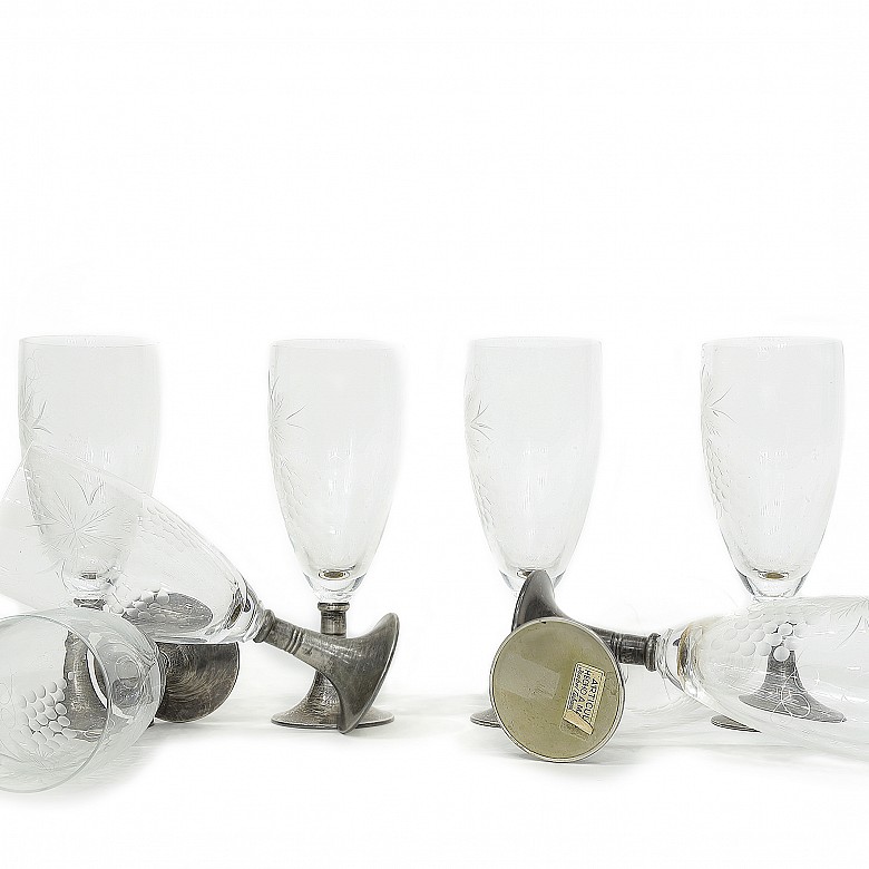 Set of eight champagne flutes with silver stem, 20th century