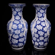 Pair of blue and white ‘Scenes and Plum Blossom’ vases, Qing Dynasty