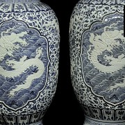 Pair of large vases with dragons, 20th century