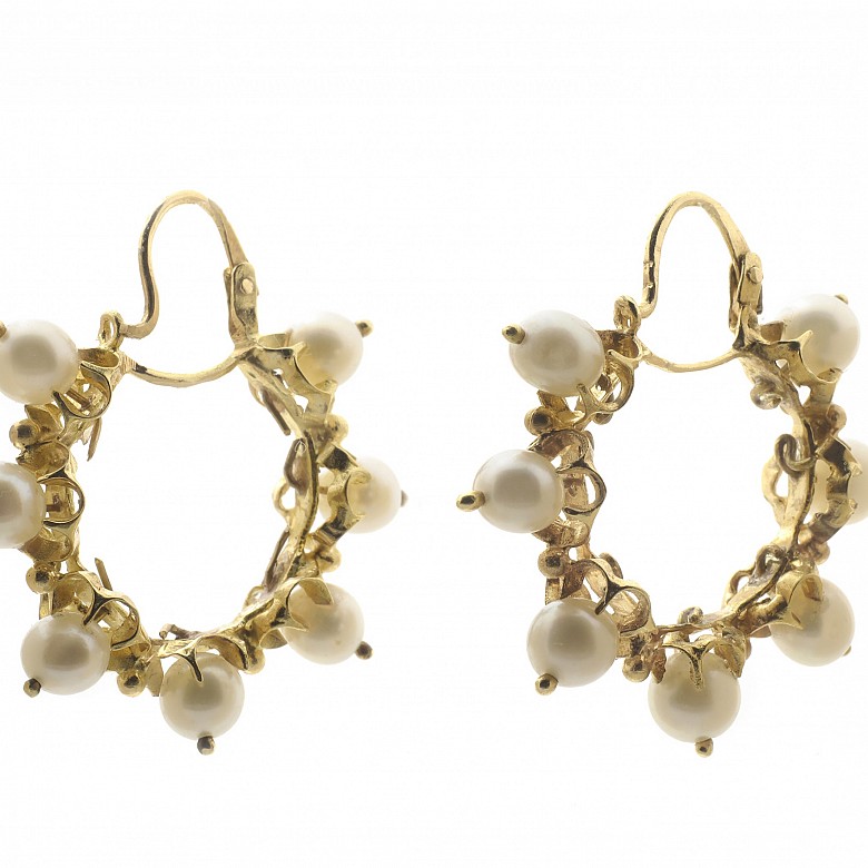 Earrings in 18k yellow gold and pearls