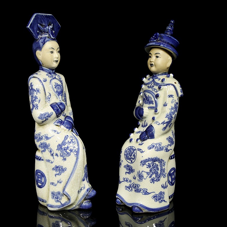 Pair of porcelain civil servants, 20th century