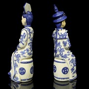 Pair of porcelain civil servants, 20th century