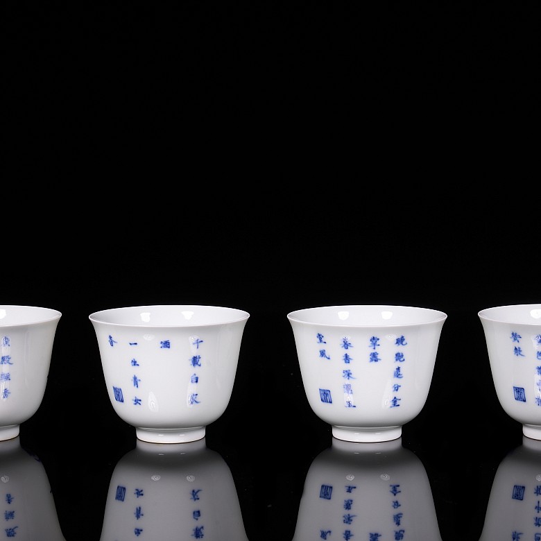 Set of twelve blue and white porcelain mugs, 20th century